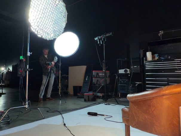 Softbox lighting rig on the dark stage of the studio