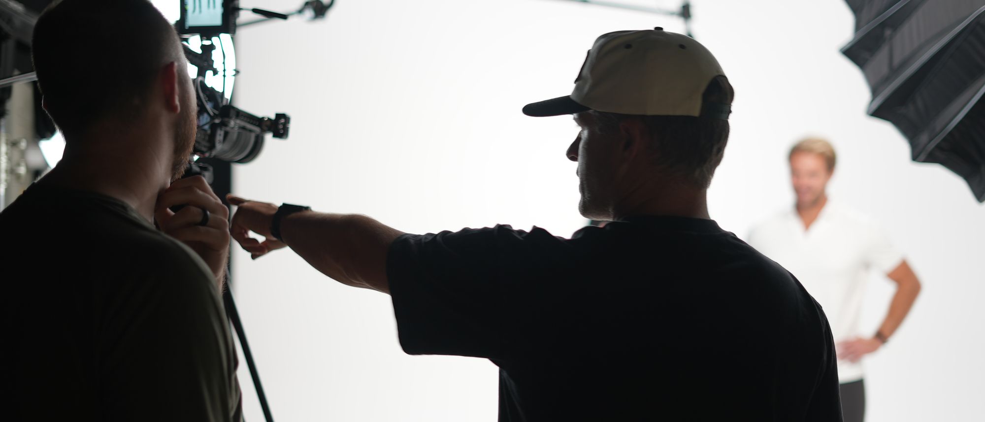 Directing a shoot on the white cyc in the Platinum Ads studio